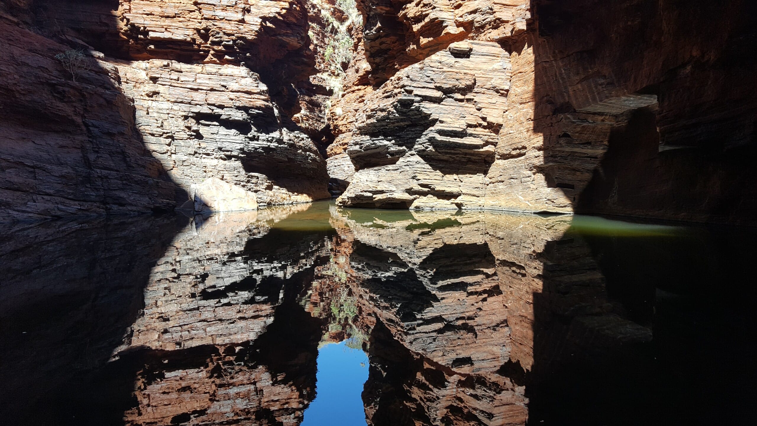 Reflective water in rocky gorge