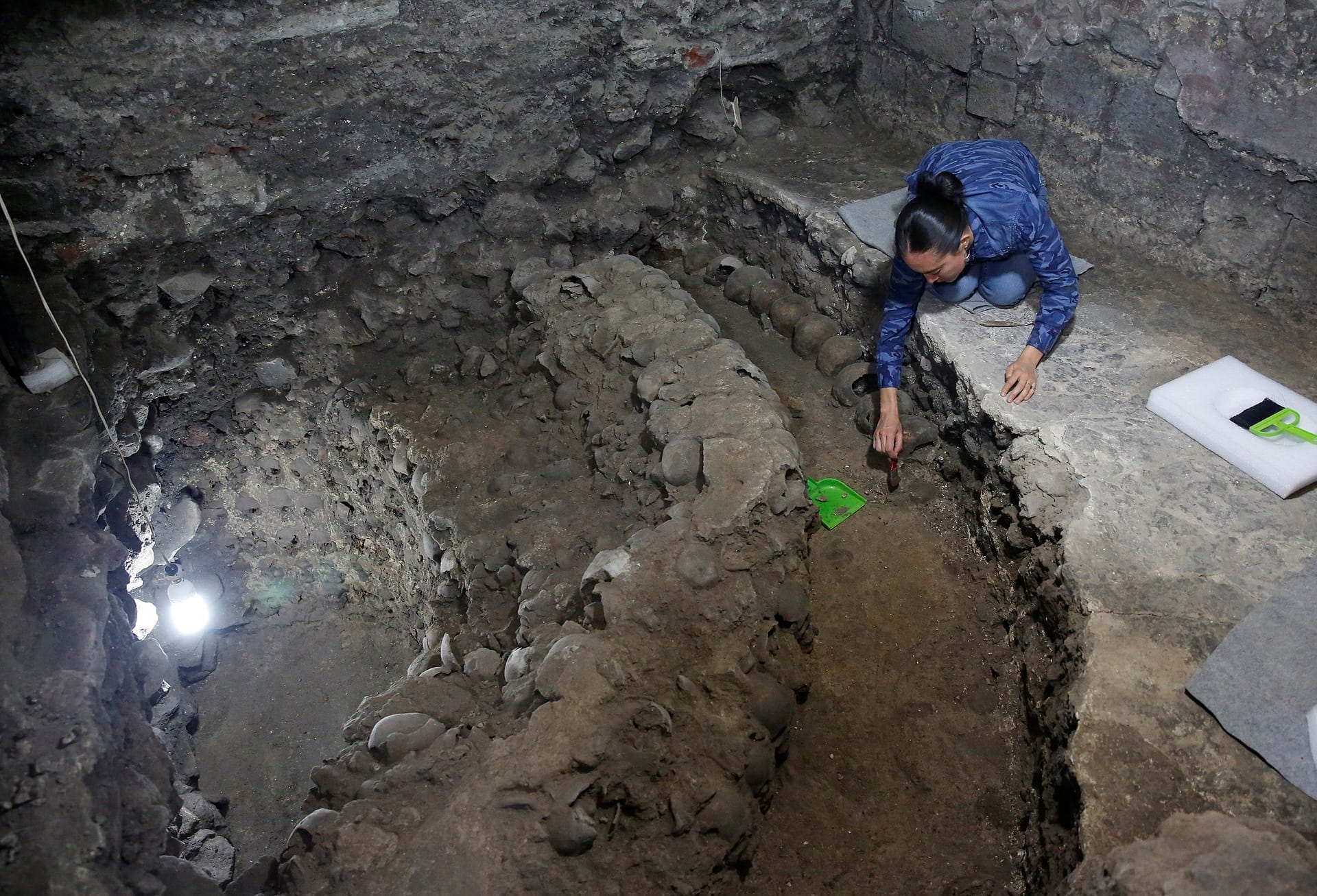 tower of human skulls at aztec dig site